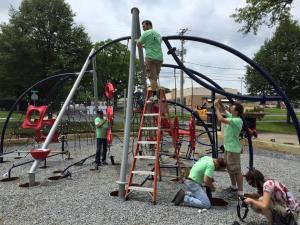 Volunteers, some of them municipal officials attending the Pennsylvania Municipal League convention in Allentown, help renovate Jordan Park. 